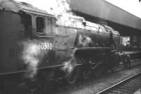 A2 Pacific no 60532 <I>Blue Peter</I> has just arrived at Buchanan Street with the 17.15 from Aberdeen in July 1966. Note the porters (remember porters?) retreiving postbags off the line where a barrow had fallen.<br>
<br><br>[Colin Miller /07/1966]