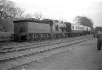 Pickersgill 3P 4-4-0 no 54465 stands at Bowhouse (closed to passengers 1930) on Saturday 7 May 1960 with a pair of ex-Caledonian coaches on an SLS rail tour which started and finished at Polmont.<br><br>[Robin Barbour Collection (Courtesy Bruce McCartney) 07/05/1960]