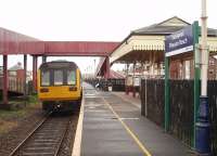 Blackpool Pleasure Beach, looking towards Squires Gate, as 142045 calls on its way to Colne on 5 May with an all stations service.<br><br>[Mark Bartlett 05/05/2009]