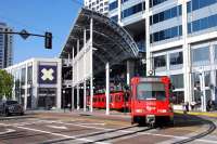 San Diego Trolley System stock pictured departing from the America Plaza stop in downtown San Diego, CA on 18 August, 2009.<br>
<br><br>[Andy Carr 18/08/2009]