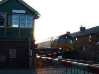 A freight heads east past Great Corby box on the Newcastle and Carlisle Railway in 2004.<br><br>[Ewan Crawford 29/02/2004]