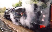 44871 leaving Clarkston <I>wrong line</I> in December 1993 with an SRPS <I>Santa Special</I> to East Kilbride.<br><br>[Ken Browne /12/1993]