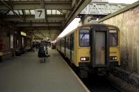 The destination blinds are blank on this Class 150 standing at platform 7 of Shrewsbury station on 28 April 1990.<br><br>[John McIntyre 28/04/1990]