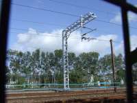 Work in progress to extend the loop at Elderslie, with new catenary masts appearing. This is being done as part of the enhancements between Shields and Paisley to provide extra capacity, as the up loop at Arkleston will be incorporated into the upgraded route.  <br><br>[Graham Morgan 09/09/2009]