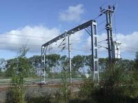 Work in progress to extend the loop at Elderslie, with new catenary masts appearing. This is being done as part of the enhancements between Shields and Paisley to provide extra capacity, as the up loop at Arkleston will be incorporated into the upgraded route.  <br><br>[Graham Morgan 09/09/2009]