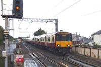 The 1043 Ayr - Glasgow Central arriving at Prestwick Town on 21 September 2009.<br><br>[Colin Miller 21/09/2009]