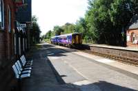 An eastbound service passes non-stop through Glazebrook.<br><br>[Ewan Crawford 10/09/2009]