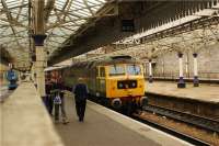 Class 47 no D1916 on the Compass railtour in Platform 6 at Aberdeen on 25 September 2009. <br><br>[John McIntyre 25/09/2009]