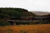 With grey clouds gathering 61994 crosses the viaduct just south of Tulloch station with <I>The West Highlander</I> on Saturday 26/09/09<br><br>[John Gray 26/09/2009]
