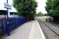 Platform view looking east from Bicester Town in September 2009. This is currently the end of the passenger service from Oxford. The line continues east to serve a rubbish compaction and landfill site at Calvert. Beyond there the track is disused through to Bletchley, with some short sections lifted. The reversing spur on the right is used to access a nearby MOD establishment.<br><br>[Ewan Crawford 06/09/2009]