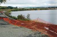 View west at Hillend reservoir in September 2009. The distant cranes are associated with the works. [See image 33478]<br><br>[Ewan Crawford 26/09/2009]