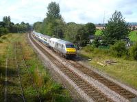 Wrexham & Shropshire Railways on time 06.45 service from London Marylebone runs by former Brymbo branch South Junction on final approach to Wrexham General Station.<br><br>[David Pesterfield 01/09/2009]