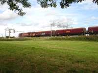 DB Schenker EWS liveried 60096 on coal empties, held at signals south of Winsford Station. Possibly running to Liverpool Docks for loading for Fiddlers Ferry Power Station working<br><br>[David Pesterfield 01/09/2009]