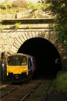 A service for Shaw from Manchester Victoria has just left Oldham Werneth and enters the first of two tunnels on route to the next station at Oldham Mumps on 01 October 2009. Werneth tunnel is 471 yards long and Central tunnel (seen at the other end of Werneth tunnel) is 449 yards long.<br><br>[John McIntyre 01/10/2009]