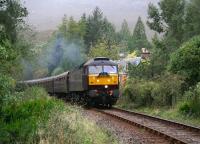 47786 approaching the platform at Achnashellach on 26 September 2009 at the head of an SRPS Railtour returning from Kyle of Lochalsh to Paisley Gilmour Street. To the right stands the former station master's house.<br>
<br><br>[John Furnevel 26/09/2009]