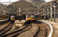 The 1607 hrs Arriva Cross Country Voyager departs from Platform 6 at Manchester Piccadilly for Bristol Temple Meads as two Pendolinos sit in the adjacent platforms awaiting their next turns to London Euston on 23 September 2009.<br><br>[John McIntyre 23/09/2009]