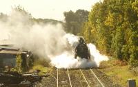 60163 'Tornado' approaches Settle with 'The Waverley' railtour on 3 October 2009. With drain cocks open the locomotive helps the Autumn 2009 RHTT programme and removes leaves from the line.<br><br>[John McIntyre 03/10/2009]