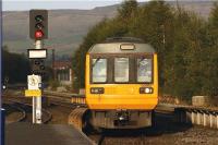 Under the shadow of the Pennines, Pacer unit 142060 arrives in the bay platform at the east end of Rochdale station on 1 October, having travelled from Manchester Victoria via Oldham. This service finishes on 3 October 2009 when the entire Oldham Loop line will close for at least two and a half years to allow conversion to Metrolink tram operation.<br><br>[John McIntyre 01/10/2009]