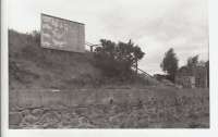 On the East side of Banchory, Cordiner's woodyard had a siding and loading dock. Their name is just about visible on their advertising hoarding, ten years after closure.<br><br>[Ken Strachan /07/1976]