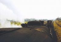 8F 48546 shunting at the Courtaulds sidings near Ribbleton on the remains of the Longridge branch. This view from the cab looks towards Preston on the branch itself with the exchange sidings off to the left. Although parts of the branch trackbed remain to this day [See image 27618] this is no longer a rural area and the fields and sidings are now a business park. (Note: This picture was previously wrongly captioned as being of 45212)<br><br>[David Hindle /07/1968]