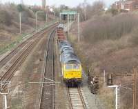 Advenza Freight, and parent company Cotswold Rail, were wound up in the High Court on 7 October. Here a crew member of Cotswold's 47810, hauling failed Advenza 47375 and its train of scrap vehicles, speaks to Preston Power Box having halted at the signal on the Up Fast due to a problem with the train. The three leased Class 66/8 locos have already gone back to Porterbrook and it remains to be seen what happens to the remainder of the companies' fleets. <br><br>[Mark Bartlett 27/02/2009]