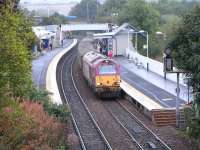 67 027 with the usual rake of six on the incoming morning Fife Inner Circle service shortly after arrival at Inverkeithing on 30 September 2009.<br><br>[David Panton 30/09/2009]