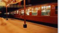 It's funny how most people go home from galas when it gets dark. I like after dark best - especially with steam. But this was a diesel gala. A pile of suitcases on the platform acted as tripod, while the old Monmouth Troy station building provided wind cover.<br><br>[Ken Strachan 27/12/2007]