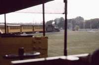 Crossroads Village is a museum village not far from Detroit. The village includes the Huckleberry Railroad, using part of the Pere Marquette Railroad trackbed in a figure-of-8 system. Baldwin 53296 is seen rounding one of the two curves.<br><br>[Ken Strachan 08/09/2001]