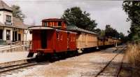 Crossroads Village is a museum village not far from Detroit. The village includes the Huckleberry Railroad, using part of the Pere Marquette Railroad trackbed. They have open-sided coaches and a rather colourful caboose.<br><br>[Ken Strachan 08/09/2001]