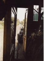 Crossroads Village is a museum village not far from Detroit. The village includes the Huckleberry Railroad, using part of the Pere Marquette Railroad trackbed. This is a view forward from the cab of their 4-6-0 no. 53296.<br><br>[Ken Strachan 08/09/2001]