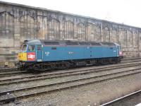 Brush Type 4 D1733 (47853) <I>Rail Express</I> rests in the sidings by Carlisle station in October 2009. The locomotive is painted in the old XP64 Inter City prototype livery from the late 1960s. <br><br>[Bruce McCartney 12/10/2009]