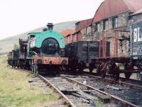 It's nice to have two steam trains stabled adjacent to the Big Pit museum. But by the state of the track in the foreground and the wagon on the right, the volunteers will be busy for years yet.<br><br>[Ken Strachan 25/05/2009]