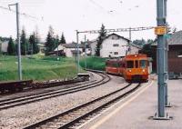 We got a lift to Lacure, bought our tickets, and chatted to the locals; but things seemed very quiet. We needn't have worried. At 3.07 precisely, the two-car unit quietly rolled in, the bored-looking crew changed ends; and 8 minutes later, we set off on a helter-skelter downhill ride to Nyon {near Geneva}. This metre-gauge Swiss branch is highly recommended - like a cross between the Ffestiniog and Sheffield trams, with touches of Carter Bar (a road on the English-Scottish border).<br><br>[Ken Strachan 13/09/2009]