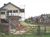 Between Penrith and Appleby lies Cliburn, closed in 1956 six years before the line itself. The station is now a private residence and the signalbox, a remarkable survivor, is currently under restoration. View east from the site of the level crossing along the old trackbed towards Kirkby Thore and Appleby. <br><br>[Mark Bartlett 12/10/2009]