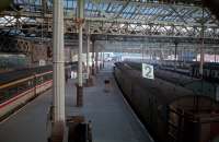 A 125 waits at platform 1, east end of Waverley station. The old platforms for Peebles, the Penicuik lines etc were busy with mail traffic. Since 1987 this end of the station has seen quite a bit of alteration. Then again, so has the other end!<br><br>[Ewan Crawford 23/10/1987]