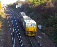 <I>Leaf-blaster</I> DR98906 joins the main line to Edinburgh after reversing in the Up Loop at Dalmeny during EGML diversions on 17 October 2009<br><br>[David Panton 17/10/2009]