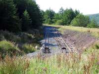 Across the road from the former Brecon and Merthyr Torpantau station, the Brecon Mountain Railway have built a new terminus (you can see the old trackbed climbing on the right). I took this picture in 2004 but there are no services yet! [See image 25885.]<br><br>[John Thorn //2004]