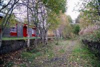 Ballindalloch Station had a passing loop and quite a large goods yard. The yard itself had two loops and four sidings. The view looks towards Advie. The goods yard has now been completely obliterated by housing and chalets.<br><br>[John Gray 20/10/2009]