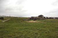 All that remains of Glassaugh Station on the Moray Coast Route. It was a two platform station with a goods yard and a small bay platform. The westbound platform has been demolished. View looks west towards Cullen.<br><br>[John Gray 22/10/2009]