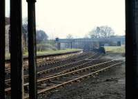 View east over the Cameron Bridge site on 7 April 1983. The location was in use and not so overgrown at this time. The distillery is behind the camera.<br>
<br><br>[Peter Todd 07/04/1983]