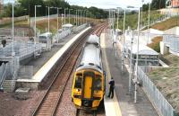 The 1024 Bathgate - Waverley service, formed by 158732, photographed on 28 August 2009 standing amongst the myriad of miscellaneous metalwork that has appeared around Livingston North station. [See image 22783]  <br>
<br><br>[John Furnevel 28/08/2009]