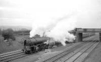 A1 Pacific no 60140 <I>Balmoral</I> with a down freight on the ECML at Lamesley, Co Durham, in October 1964. The locomotive will shortly pass under the bridge carrying the powered incline which transferred coal from Ravensworth Ann Colliery (closed 1973), about half a mile east of the main line, to interchange sidings on the west side between Lamesley and Low Fell.<br><br>[Robin Barbour Collection (Courtesy Bruce McCartney) 24/10/1964]