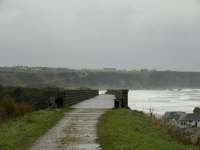 Looking over the eight arch viaduct at Cullen towards Portknockie, one and three quarter miles in the distance. The viaduct is now part of a walkway/cycle path and has been re-surfaced with concrete.<br><br>[John Gray 22/10/2009]