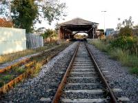 Filey station looking south from the level crossing late in the afternoon of 19 October 2009. Under the NER overall roof is a NER footbridge.<br><br>[John McIntyre 19/10/2009]