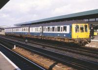 DMU set L415 stands at Oxford in February 1983 about to leave for Didcot once somebody shuts that door.<br>
<br><br>[Peter Todd /02/1983]