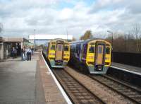 Opened in 1973 as Alfreton and Mansfield Parkway this station replaced an earlier one closed in 1967. In 1994, recognising the Robin Hood line developments, it became simply Alfreton. Here two Sunday morning services call at the station, both using former West Yorkshire PTA Class 158/9 units. <br><br>[Mark Bartlett 25/10/2009]