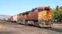 BNSF Dash 9-44CW's no 4441 and 1004 pause in the yard at Livingston, Montana with a westbound freight on 21 September 2009.  Prior to the assault on the 5,800 feet high Bozeman Pass the train was split into two parts and three Montana Rail Link locomotives were inserted in the middle (to provide motive power and relieve strain on the couplings). A third BNSF locomotive was also located at the rear of the train.<br><br>[Andy Carr 21/09/2009]