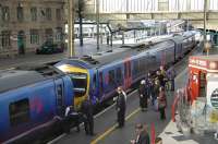 FTPE 185138 and 185126 at Carlisle following arrival from Edinburgh and Glasgow respectively on 26 October, in the process of combining for the remainder of the journey to Manchester Airport.<br><br>[Bill Roberton 26/10/2009]