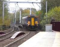 Northbound 156456 approaches the now fenced off wooden southern end to the platforms at Coatbridge Central with a service for Cumbernauld on 28 October 2009.<br><br>[David Panton 28/10/2009]