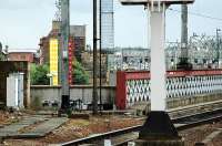 This shot at Glasgow Central is to show the north end and approach to the original bridge over the River Clyde. In the distance the site of Bridge Street station can be seen with a Pendolino approaching along the mainline tracks - it would once have come straight towards the camera. The bridge to the right is a modification to the additional bridge built in 1906.<br><br>[Ewan Crawford 05/07/2005]